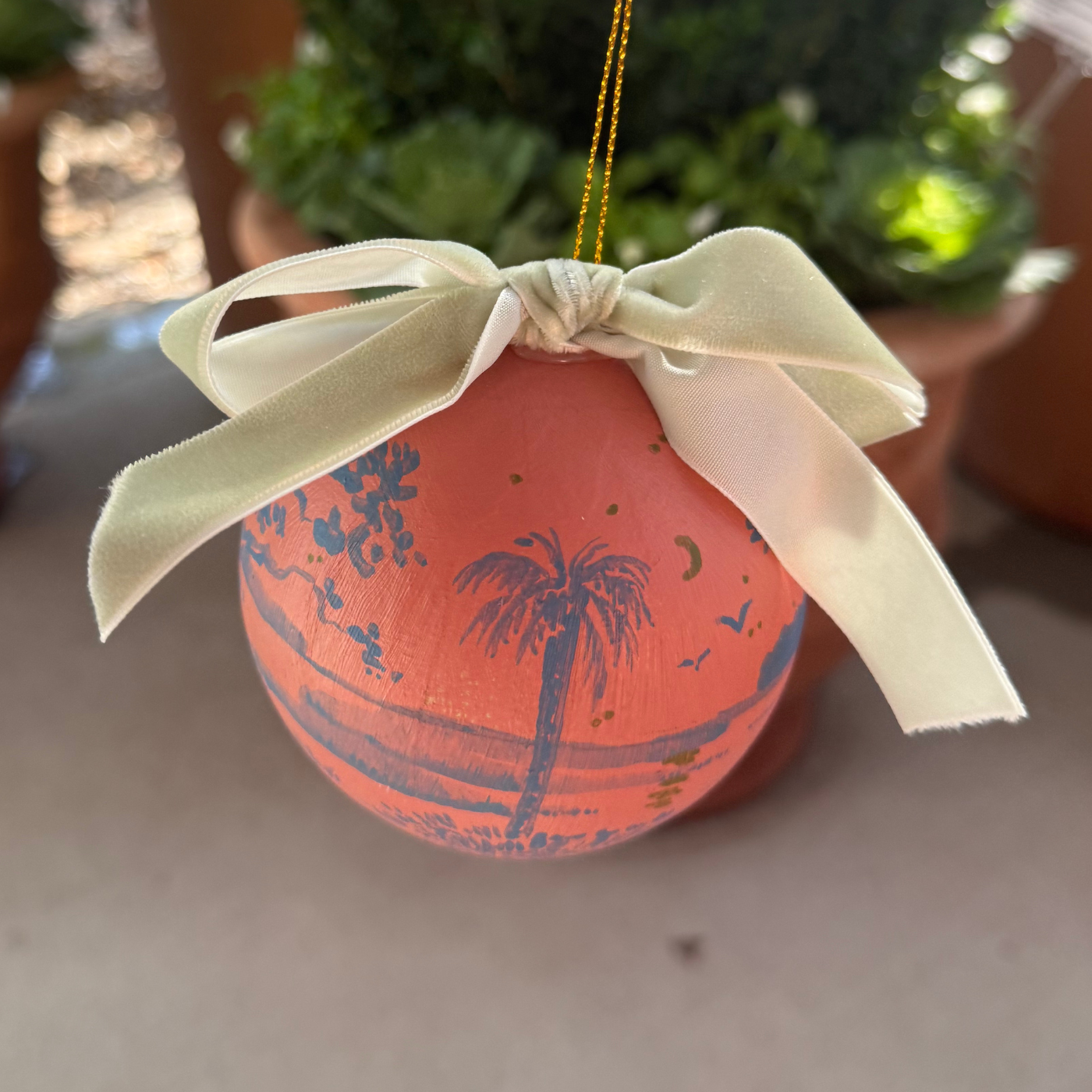 Hand-painted Ornament by Sarah Schools - Blue on Pink