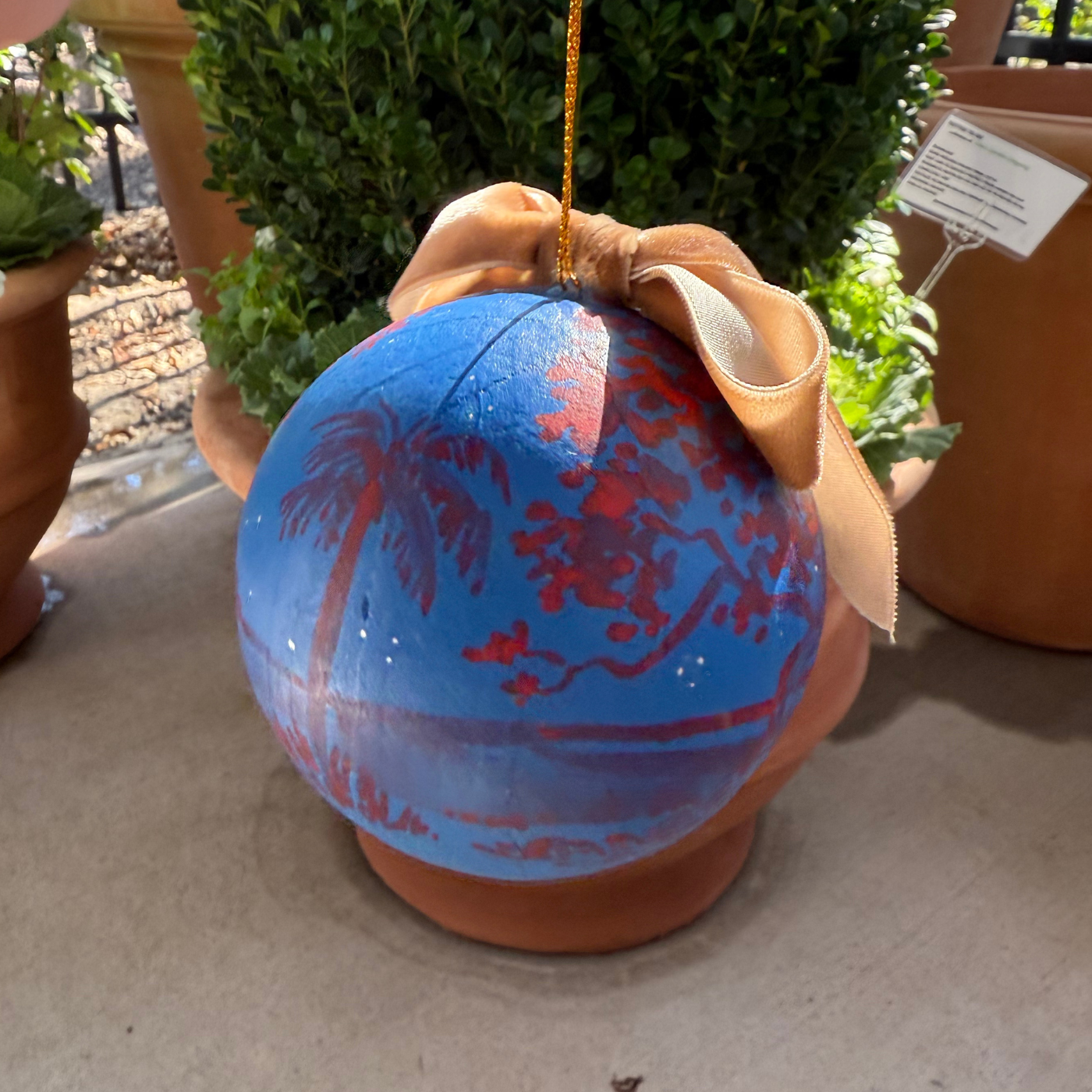 Hand-painted Ornament by Sarah Schools - Red on Blue